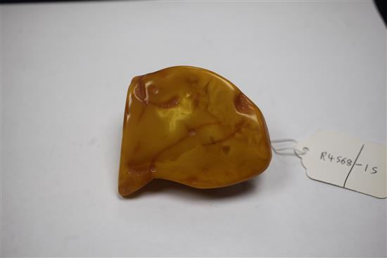 A free form piece of raw amber, gross weight 99 grams, 80mm.